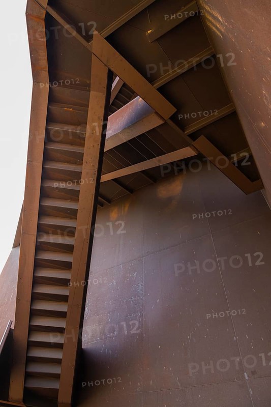 The Rusty Nail, a 30m high observation tower on the Sorno Canal, built of Corten steel. The name originated because the tower is covered with a reddish-brown patina