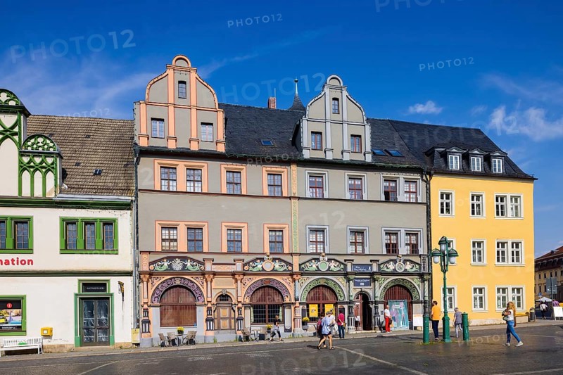 The square was given its distinctive shape in the 16th century by the town house and the semi-detached house to the east, the left half of which is now known as the Cranach House, the Court Pharmacy to the north and the inn Zum Schwarzen Bären to the south.In the centre of the market, the Neptune Fountain