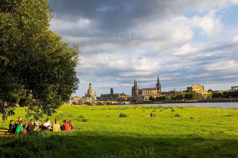 Dresden's old town silhouette in the summer sunlight, the Elbe is slightly flooded after heavy rainfall