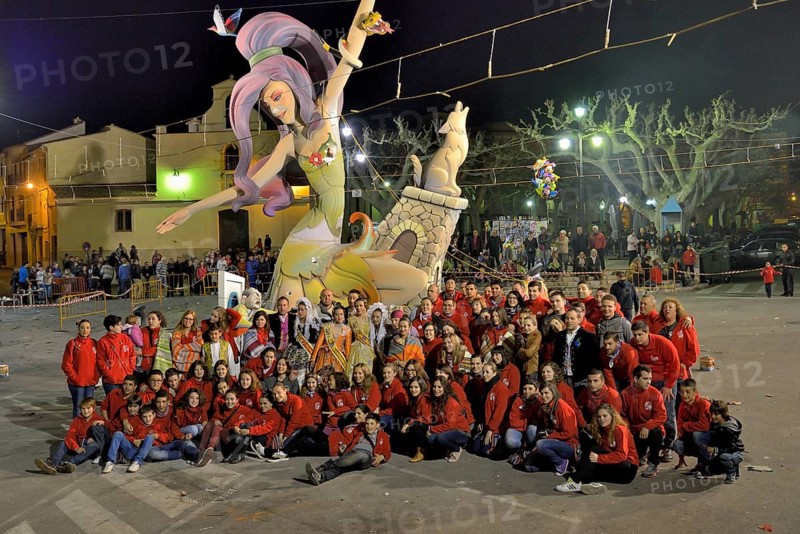 "La Font" Fallas group in front of a Falla, a papier-mâché figure, at the Falles or Fallas spring festival, Pego, Province of Alicante, Spain, Europe