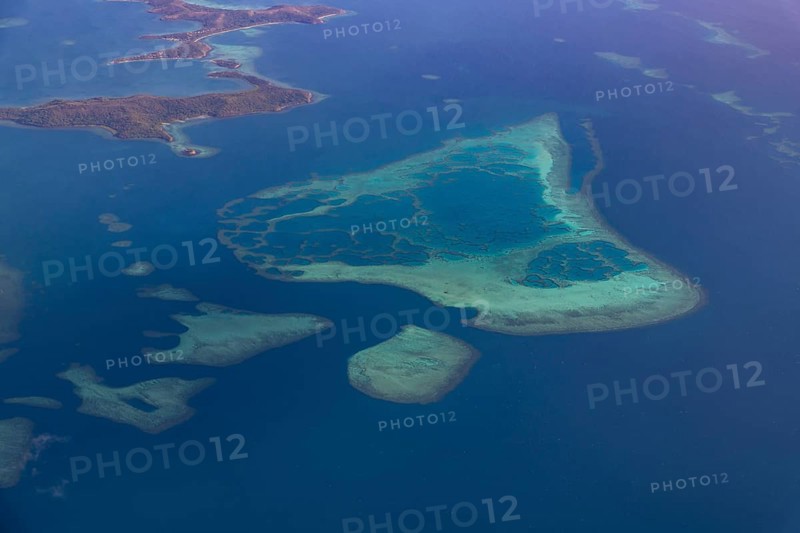 Aerial of little islets of the coast of Viti Levu, Fiji, South Pacific, Oceania