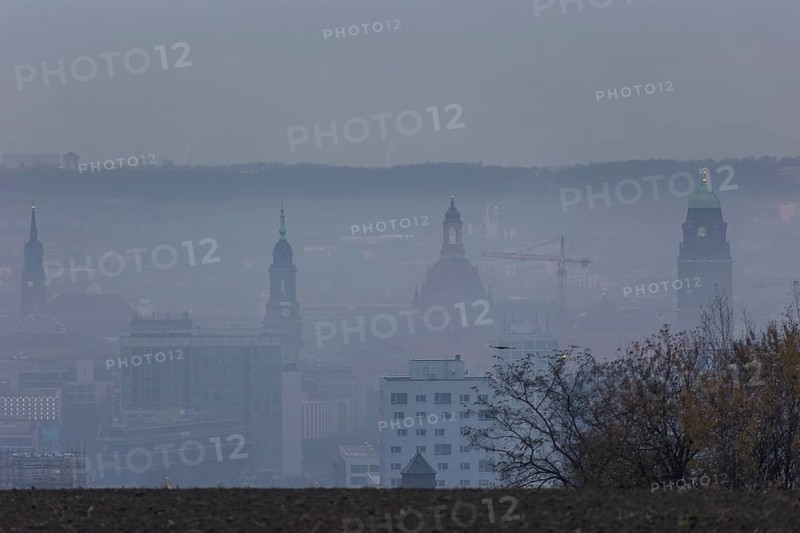 View from Dresden's Südhöhe of the city centre with its towers sinking into the fog