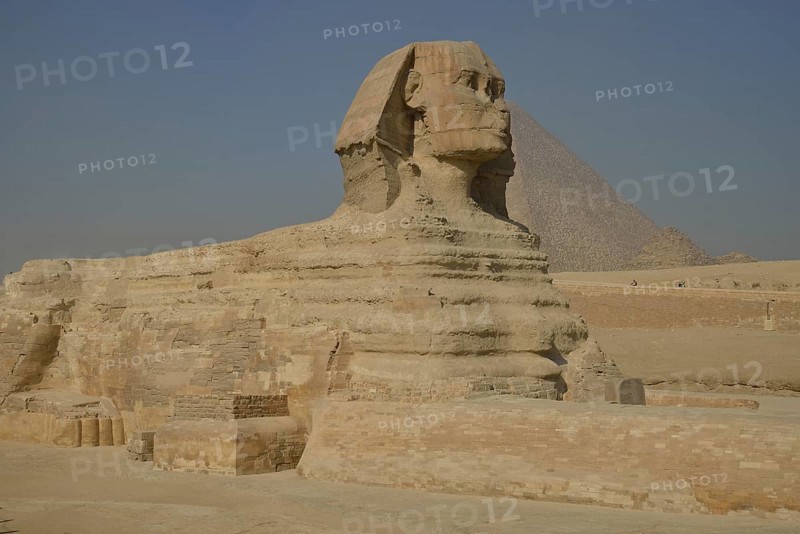 Sphinx or Great Sphinx of Giza, lion with a human head, built in the 4th Egyptian dynasty around 2700 BC, in front of the Pyramid of Cheops, Giza, Egypt, Africa
