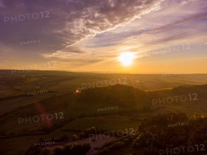 Drei Gleichen (also: Gleichen castles) is the name for a medieval castle ensemble consisting of Wachsenburg, Burg Gleichen and Mühlburg in Thuringia, as well as for the mountain ensemble on which the castles stand. Evening sky at Wachsenburg Castle
