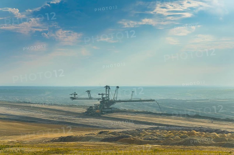 Stacker 1102 A2Rs-B 15400.120 distributes the overburden on the recultivation area in the Nochten opencast mine