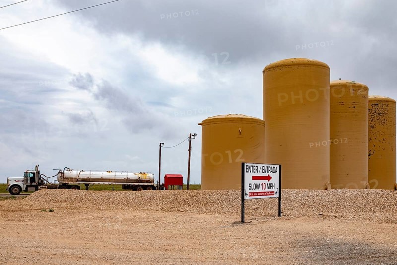 Maljamir, New Mexico, Tanks hold brine water for disposal in the Permian Basin oil fields. The salty brine (also called produced water) is brought to the surface as a byproduct of oil or gas production