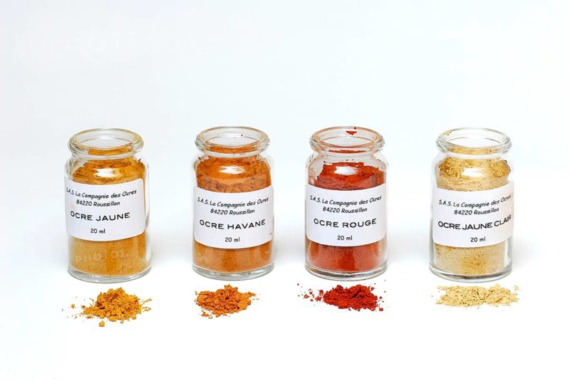 Ochre powder, different shades in bottles, earth colour, pigment, Roussillon, Provence, South of France