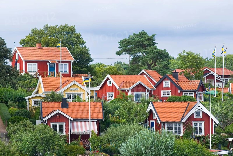 Typical settlement with wooden houses, Swedish house, red, sea, holiday home, holiday in Karlskrona, Sweden, Europe