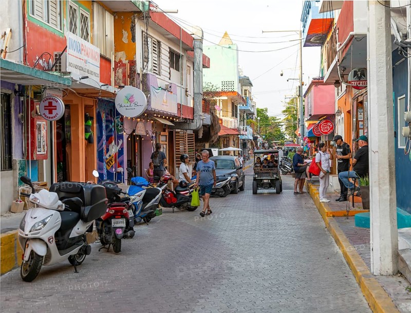 Golf cart vehicles in narrow street, Isla Mujeres, Caribbean Coast, Cancun, Quintana Roo, Mexico, Central America