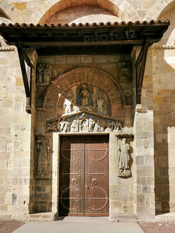 Clermont Ferrand. Tympanum of the romanesque church of Notre Dame du Port. Puy de Dome department. Auvergne Rhone Alpes. France