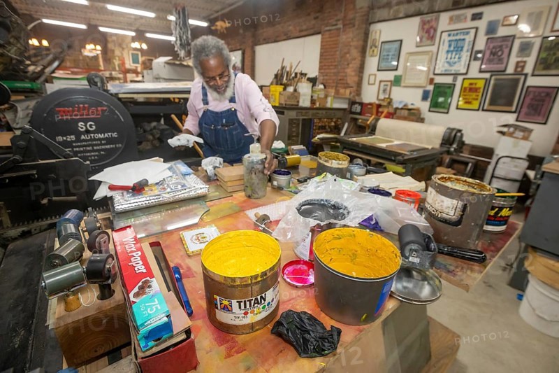 Detroit, Michigan, Amos Kennedy works in his letterpress printing shop. Kennedy prints posters and gives workshops on letterpress printing