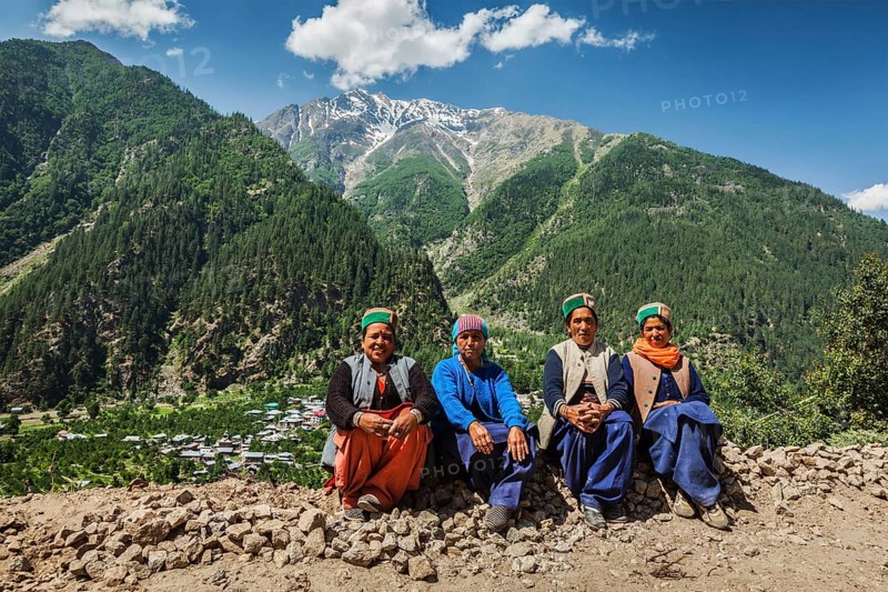 SANGLA, INDIA, JUNE 28, 2012: Indian women of Himachal Pradesh state of India in traditional Kinnaur hats in Himalayas