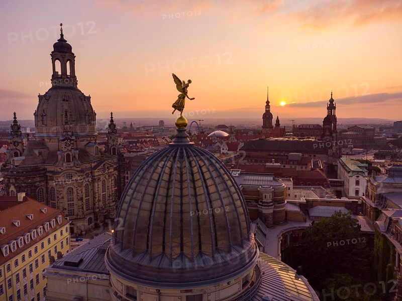 Dresden's old town from above.The glass dome of the Academy of Arts, crowned by a Fama figure, under which there is an exhibition room, called a lemon squeezer after its shape