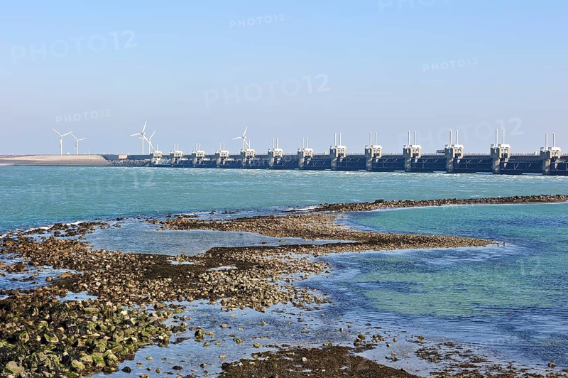 Storm surge barrier, Oosterscheldekering, storm surge barrier of the Oosterschelde at Neeltje Jans, part of the Delta Works, which regulate the enormous tidal currents and harness the spring tides. The Netherlands
