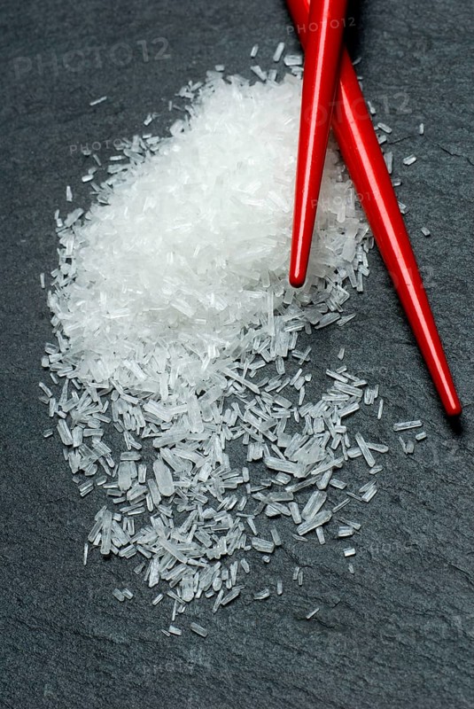 Crystalline glutamate with chopsticks, flavour enhancer