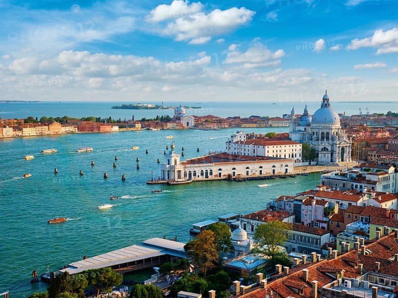 View of Venice lagoon and Santa Maria della Salute church on summer day. Venice, Italy, Europe