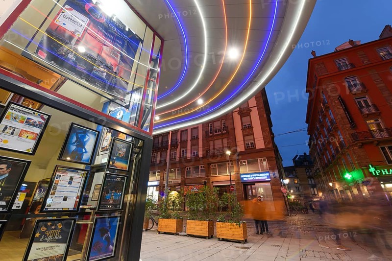The Vox cinema in Strasbourg is illuminated at night. Bas-Rhin, Alsace, Grand Est, France, Europe