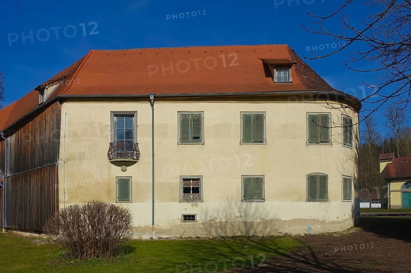 Old castle, classicist castle complex Krauchenwies from 1769 to 1785, three-winged building of early classicism, moated castle, historic building, architecture, cultural monument, castle ruins in the Princely Hohenzollern Park, castle in desolate condition, lost place, castle park, hipped roof, Krauchenwies, Sigmaringen district, Baden-Württemberg, Germany, Europe