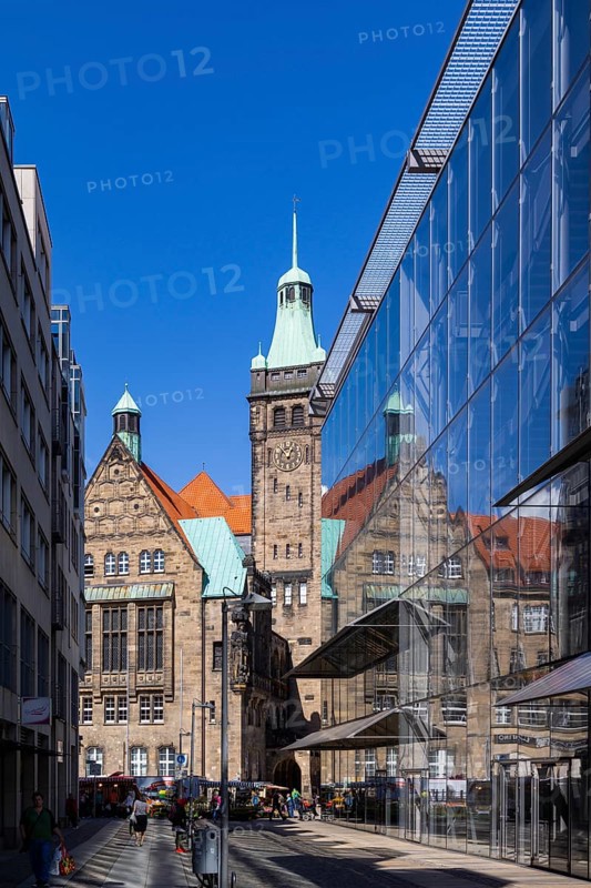 View through Bretgasse to the town hall with the reflection in Galeria Kaufhof