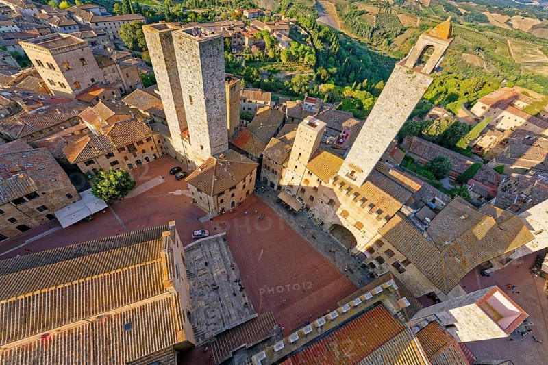 View from the Tower, Torre del Palazzo del Popolo onto the Piazza del Duomo, the Pallazzo del Podest and the Torri dei Salvucci, San Gimignano, Province of Siena, Tuscany, Italy, UNESCO World Heritage Site, Europe