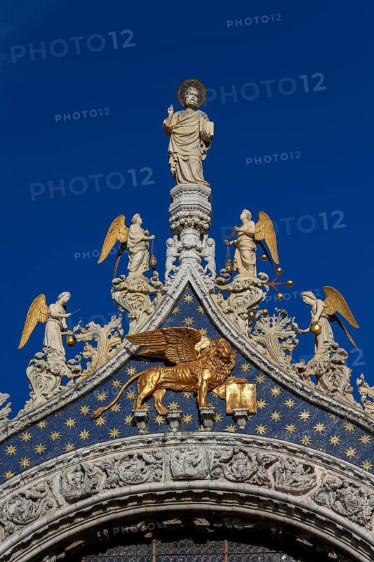 Sculptures and St. Mark's lion on the facade of St. Mark's Cathedral, Venice, San Marco district, Veneto region, Italy, Europe