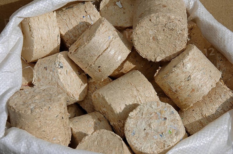 Firewood, wood briquette pressed from wood fibre