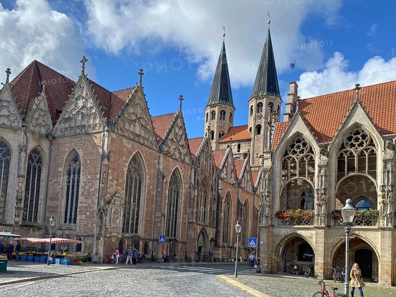 Historic Gothic-style church in the city centre under a blue sky with clouds, Altstadtmarkt, Martinikirche, Dornse, Braunschweig, Lower Saxony, Germany, Europe