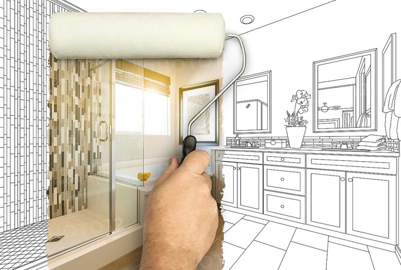 Before and after of man painting roller to reveal newly remodeled master bathroom under pencil drawing plans