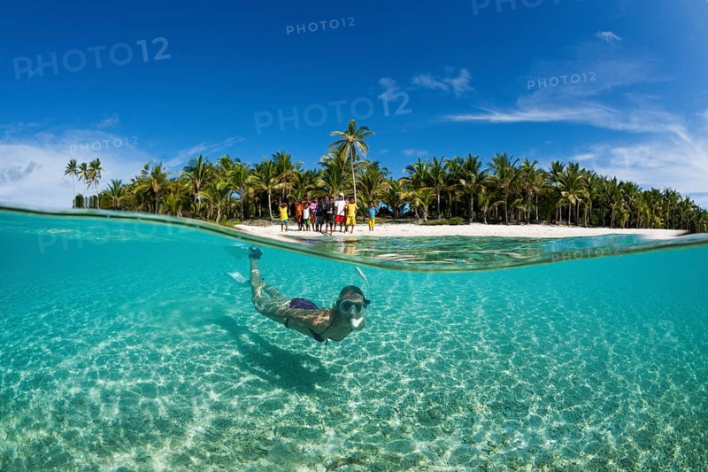 Snorkelling off Palm Island, Fadol, Kai Islands, Moluccas, Indonesia, Asia