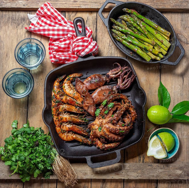 Food, Grilled spimps, squids and octopus in cast iron grill pan