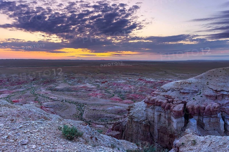 Textural colorful striped canyons Tsagaan suvarga (White stupa) at sunrise. Ulziit soum, Dundgovi province, Mongolia, Asia