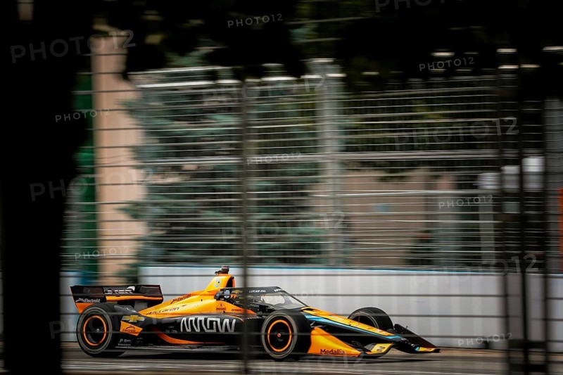 PATO OWARD (5) of Monterey, Mexico runs through the streets during the Honda Indy Toronto in Toronto, ON, CAN