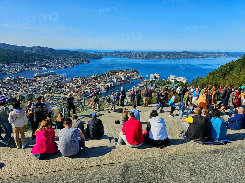 View of the city of Bergen with fjord, Bergen and a crowd of people admiring the scenery, Fløibanen mountain station, Bergen, Vestland, Norway, Europe