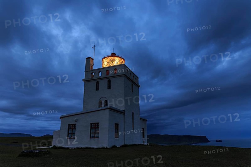 Lighthouse at the coast, twilight, cloudy mood, Dyrholaey, Iceland, Europe