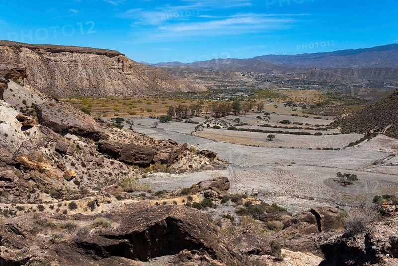 Gorge in a dry mountain landscape with rocks and a clear blue sky, Llano de Buho, Tabernas Desert, Desierto de Tabernas, location of numerous films and westerns, Tabernas, Almeria, Andalusia, Spain, Europe