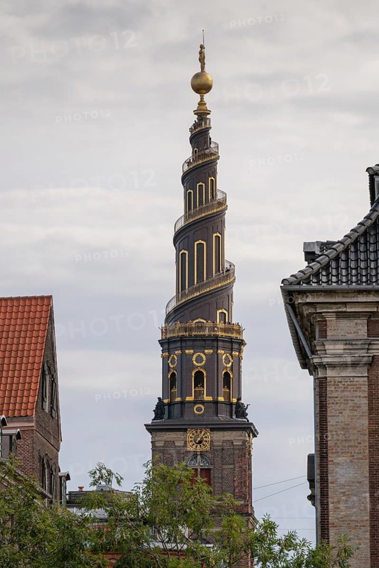 Corkscrew-shaped tower of the Evangelical Lutheran Church of the Saviour, in front of Frelsers Kirke, Christianshavn, Copenhagen, Denmark, Europe