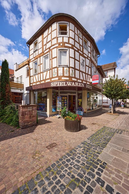 Toy shop in a rounded half-timbered house in Braunstraße in Michelstadt, Odenwald, Odenwaldkreis, Hesse, Germany, Europe