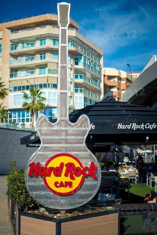 Malaga, Spain, April 2023: View on outdoors guitar of the Hard Rock Cafe in Malaga, Spain, Europe