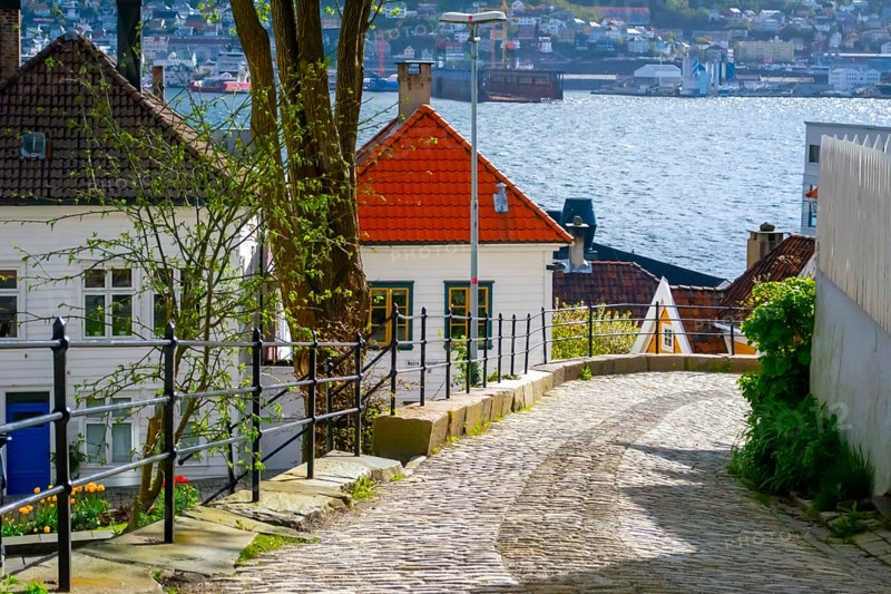 Bergen, Norway, May 2015: Cozy cobblestoned street in the historical center of Bergen, Norway, Europe