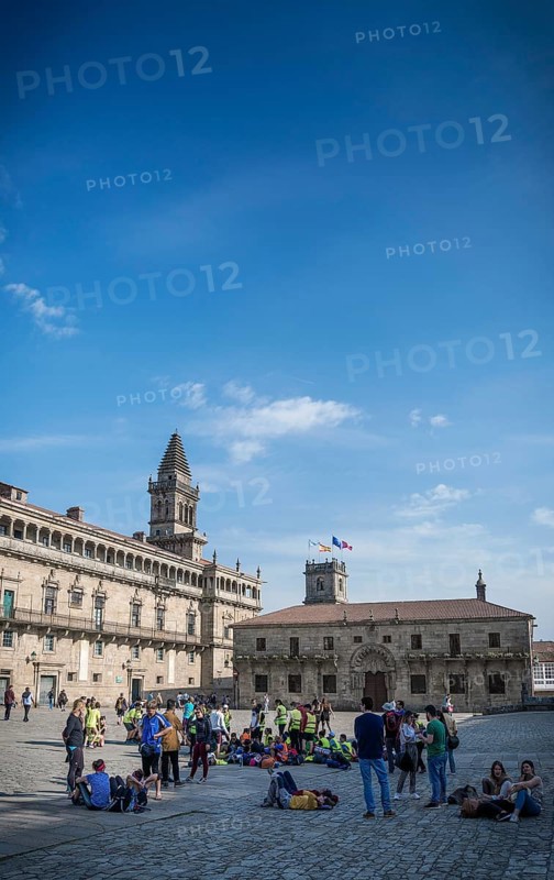 Tourists at old town landmark Obradoiro Square near santiago de compostela cathedral spain