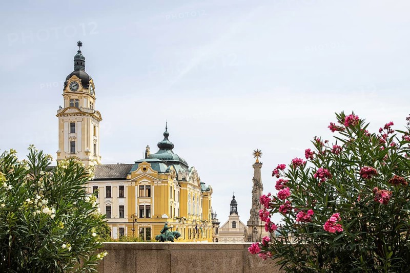 Historic city centre and central square with old historic buildings. Széchenyi Square in the centre of the five-church town shows the historical heritage of the city of Pécs, Dél-Dunántúl, Hungary, Europe
