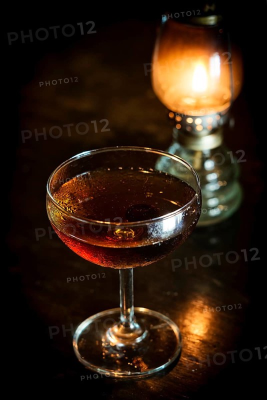 Manhattan classic whisky cocktail drink in modern bar