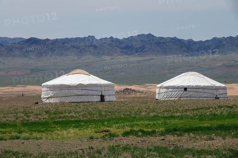 Traditional yurts between montains in Mongolia