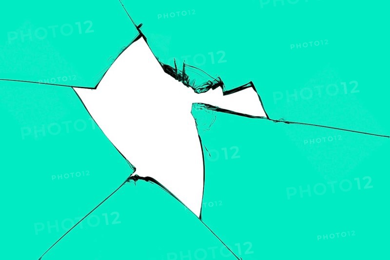 Broken pieces glass mirror isolateda piece of broken glass with a hole and cracks. Green window with white background in center, destruction effect, texture for design