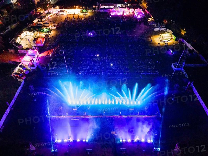 At Elementaro, a water and light show taking place in Bad Vilbel from 20 to 22 September 2024, the combination of moving water fountains over 35 metres high, classical, modern and nostalgic music, fantastic images and emotional videos, an oversized large water wall, impressive fire compartments and countless lasers captivates the audience. (Aerial view with a drone), Bad Vilbel, Hesse, Germany, Europe