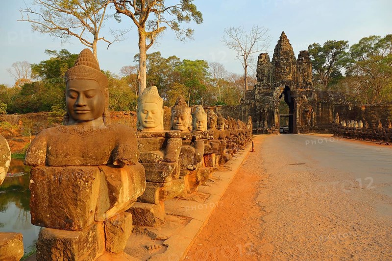 Stone carved statues of Devas on the bridge to Angkor Thom, Siem Reap, Cambodia, Asia