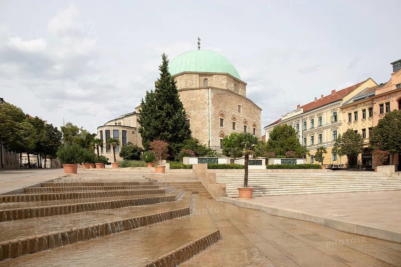 Historic city centre and central square with old historic buildings. Széchenyi Square in the centre of the five-church town shows the historical heritage of the city of Pécs, Dél-Dunántúl, Hungary, Europe