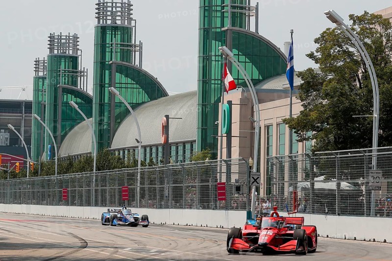 BENJAMIN PEDERSEN (R) (55) of Copenhagen, Denmark runs through the streets during the Honda Indy Toronto in Toronto, ON, CAN