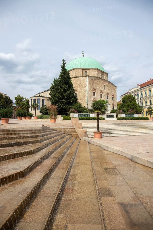 Historic city centre and central square with old historic buildings. Széchenyi Square in the centre of the five-church town shows the historical heritage of the city of Pécs, Dél-Dunántúl, Hungary, Europe