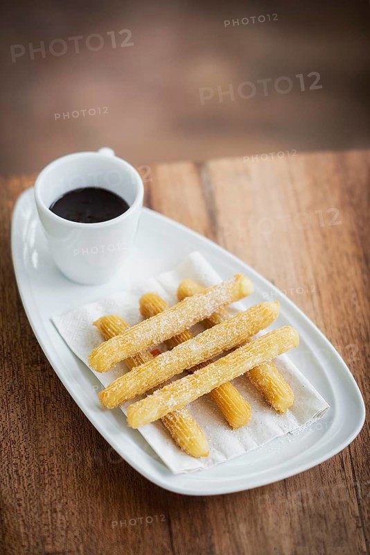 Chocolate and churros traditional spanish breakfast tapa snack food